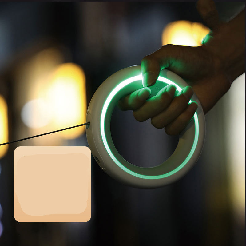 Smart LED Retractable Dog Leash – Night Light Grip, Sleek Ring Design